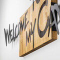 Decoratiune de perete, Welcome To My Cave, Metal/lemn, Dimensiune: 128 x 3 x 39 cm, Nuc / Negru